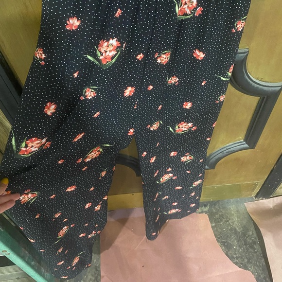 Black floral jumpsuit with white polkadots. Worn a handful of times. - Picture 2 of 4